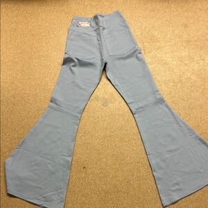 flare is 15” wide from top of stretch material  to bottom is 39”